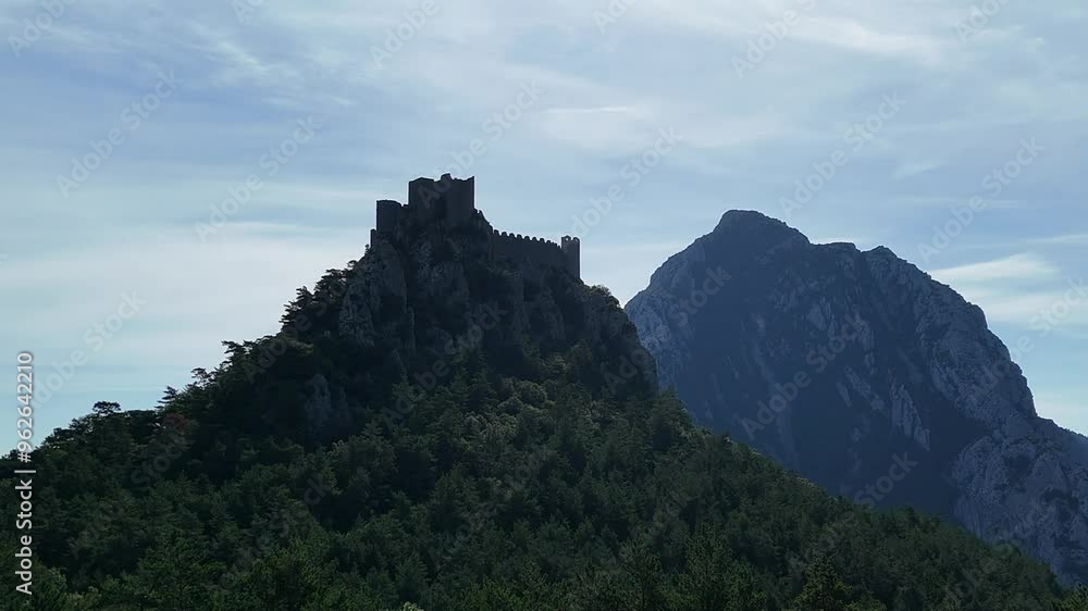 Ruins of the Cathar castle of Puilaurens in Occitanie in France in summer Ruins of the Cathar castle of Puilaurens in Occitanie in France in summer