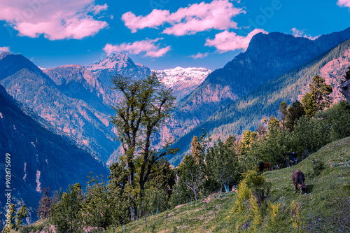 View of the mountains. Dodra and Kwar are two beautiful scenic villages in a remote part of the Himalayas in Himachal Pradesh (India). It is situated at a height of 2500 mts, above sea level. photo