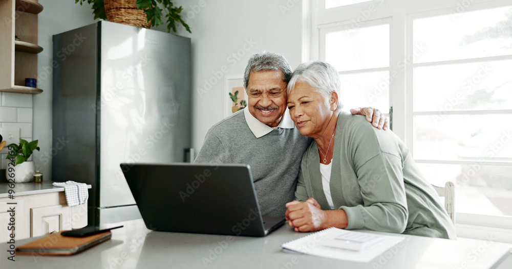 Senior, happy couple and hug with documents on laptop for retirement, finance or pension fund in kitchen at home. Elderly man, woman or lovers with smile on computer for embrace or financial planning Senior, happy couple and hug with documents on laptop for retirement, finance or pension fund in kitchen at home. Elderly man, woman or lovers with smile on computer for embrace or financial planning