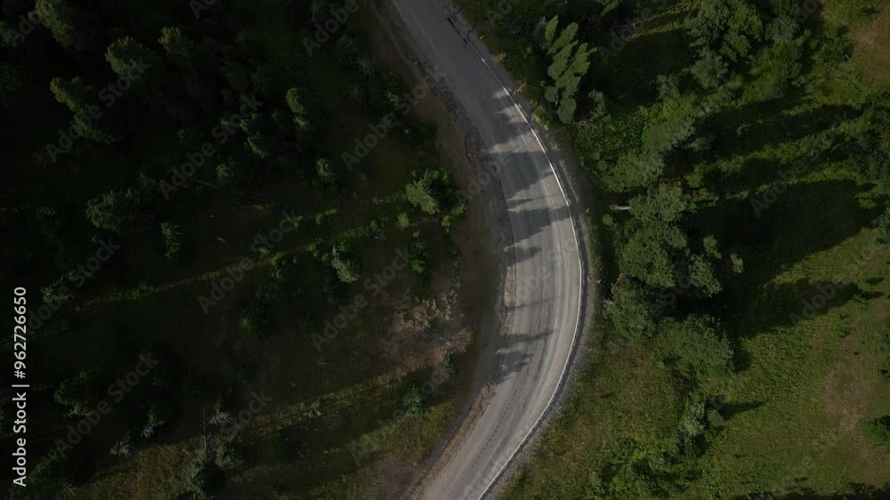 Top down aerial above two lane highway in Bridger Range in Montana in summer Top down aerial above two lane highway in Bridger Range in Montana in summer