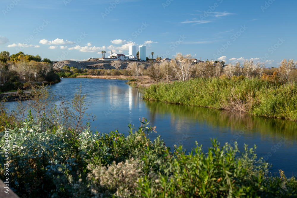 Wetlands environment with church in distance Wetlands environment with church in distance