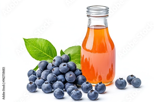 Fresh Nance Juice Bottle With Nance Berries isolated on a white background photo