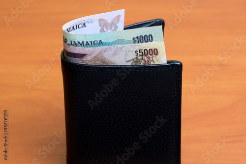 Jamaican dollar in the black wallet