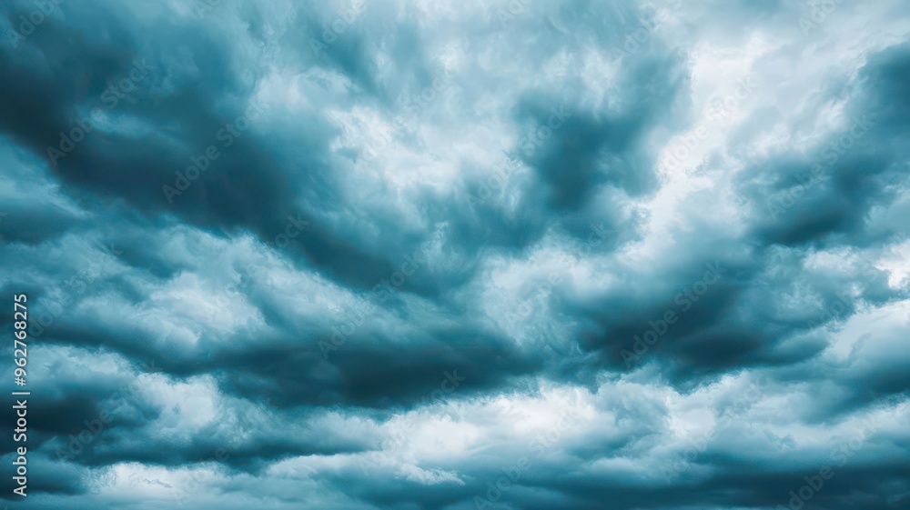 Dramatic sky filled with dark, moody clouds suggesting a stormy weather ahead, creating a captivating atmosphere. Dramatic sky filled with dark, moody clouds suggesting a stormy weather ahead, creating a captivating atmosphere.