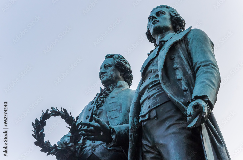 Statue of famous german writers Goethe and Schiller in Weimar, Germany