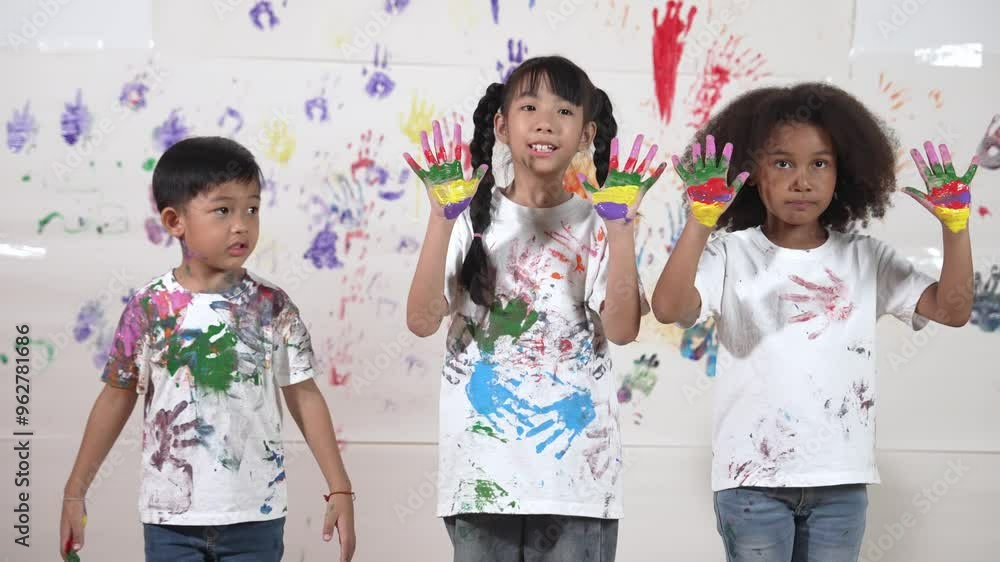 Diverse students put hand up together show colorful stained hands. Group of learner standing in front white background with stained hands while looking at camera. Creative activity concept. Erudition. Diverse students put hand up together show colorful stained hands. Group of learner standing in front white background with stained hands while looking at camera. Creative activity concept. Erudition.