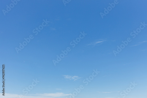 Fotografie Blue Sky. Clouds in blue sky in sunny day