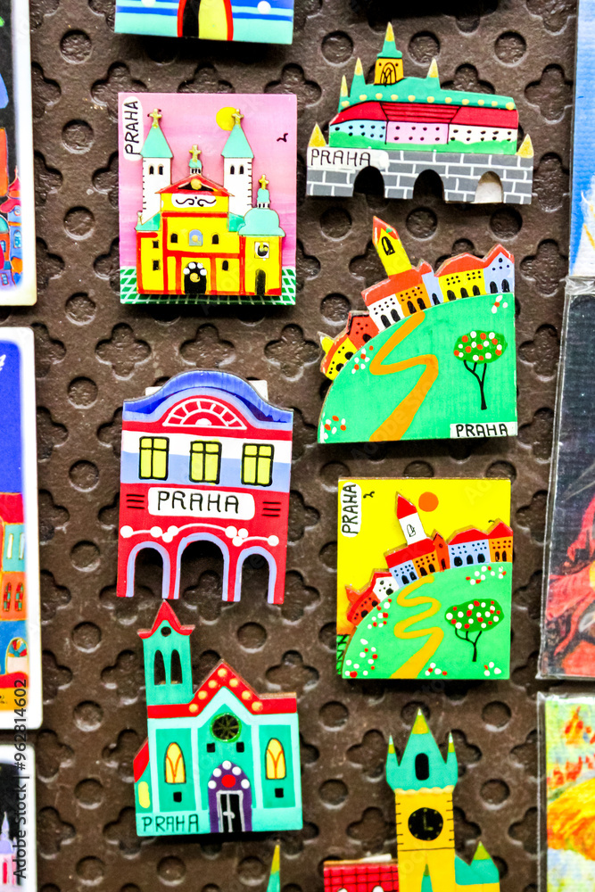 Naklejka premium Colorful Prague magnets on a display board, perfect for Czech Republic souvenirs and travel memories during Christmas vacations