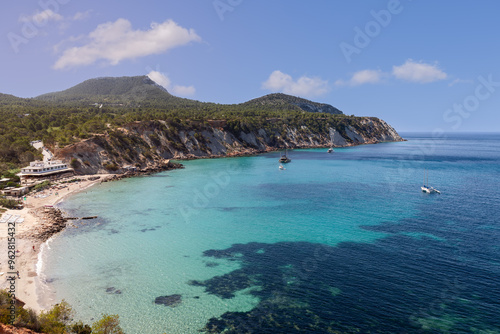 Slika na platnu Overlooking Cala d Hort beach in Ibiza, this image captures pristine emerald wat