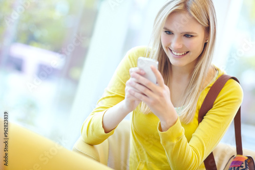 Wallpaper Mural Girl, travel and typing on mobile phone, airport or waiting area on study abroad or journey. Female person, tech and trip for education, course or college on holiday or vacation as university student Torontodigital.ca