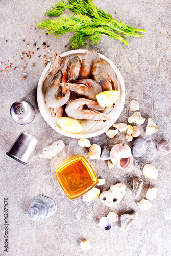 raw shrimps on white plate photo