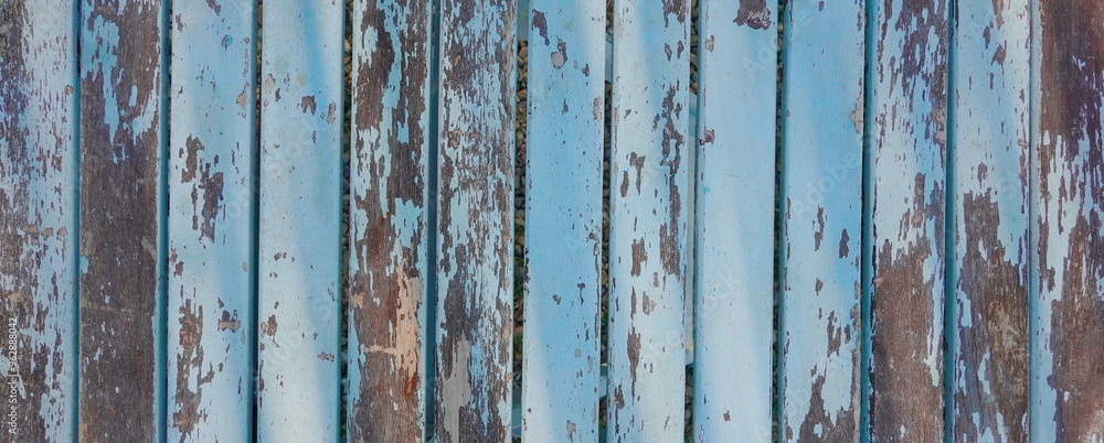 Aged Patina on Weathered Blue Wooden Boards. The Rustic Charm of Faded Paint and Time-Worn Wood Aged Patina on Weathered Blue Wooden Boards. The Rustic Charm of Faded Paint and Time-Worn Wood
