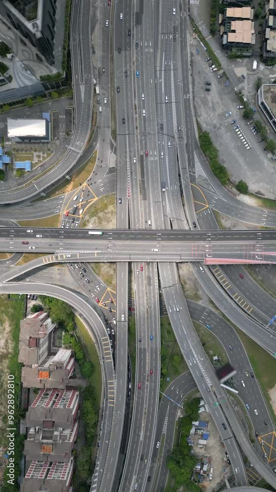 Aerial view of morning traffic on multi-lane road in downtown Kuala Lumpur, Malaysia. Aerial view of morning traffic on multi-lane road in downtown Kuala Lumpur, Malaysia.