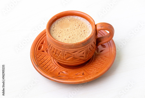 Canvastavla Hot milk tea or dudh cha served in a natural clay cup.