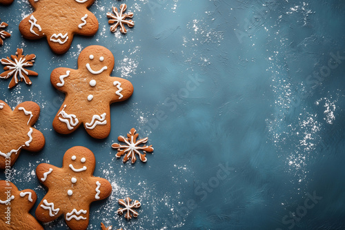 handmade gingerbread cookies on blue background photo