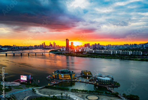 Seocho-gu, Seoul, South Korea - May 22, 2020: Aerial and sunset view of Sevit Floating Island on Han River against Dongjak Bridge and Yeouido photo