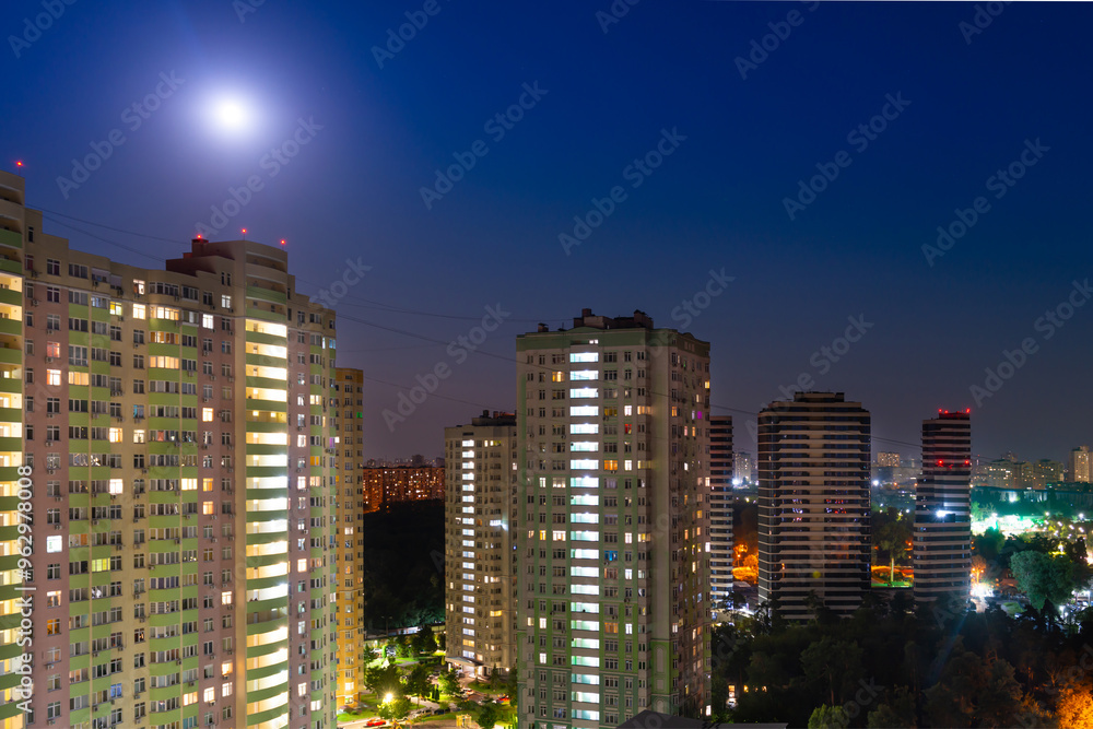 Obraz premium City at night, city night street with buildings and night moon light. Kyiv city, Ukraine