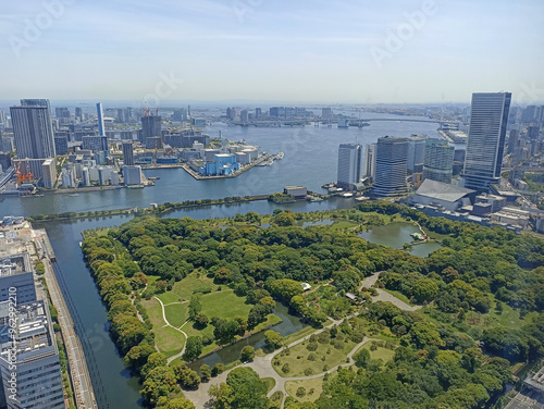 A view of Tokyo Bay and Hamarikyu Gardens from Caretta Shiodome in Tokyo, Japan