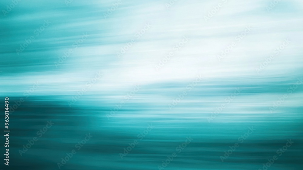 Defocused motion blur in shades of teal and light blue, creating a calming and serene horizontal abstract background. Defocused motion blur in shades of teal and light blue, creating a calming and serene horizontal abstract background.