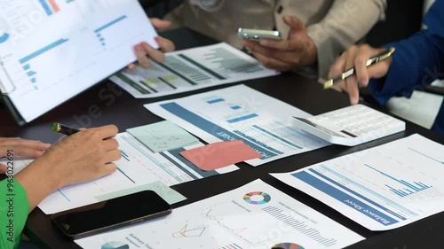 Wallpaper Mural Businessmen team or financial data analysts working with tablets and laptop computers and data graphs together. Plan to analyzing projects in the office. Torontodigital.ca