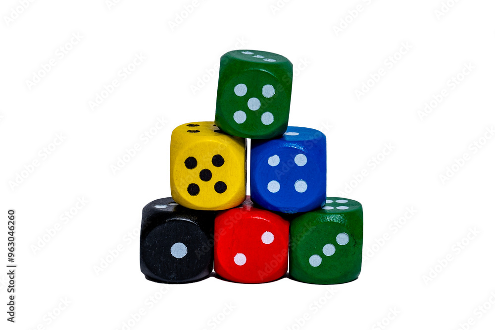 Different colored dice on a transparent background. Five bright colors.