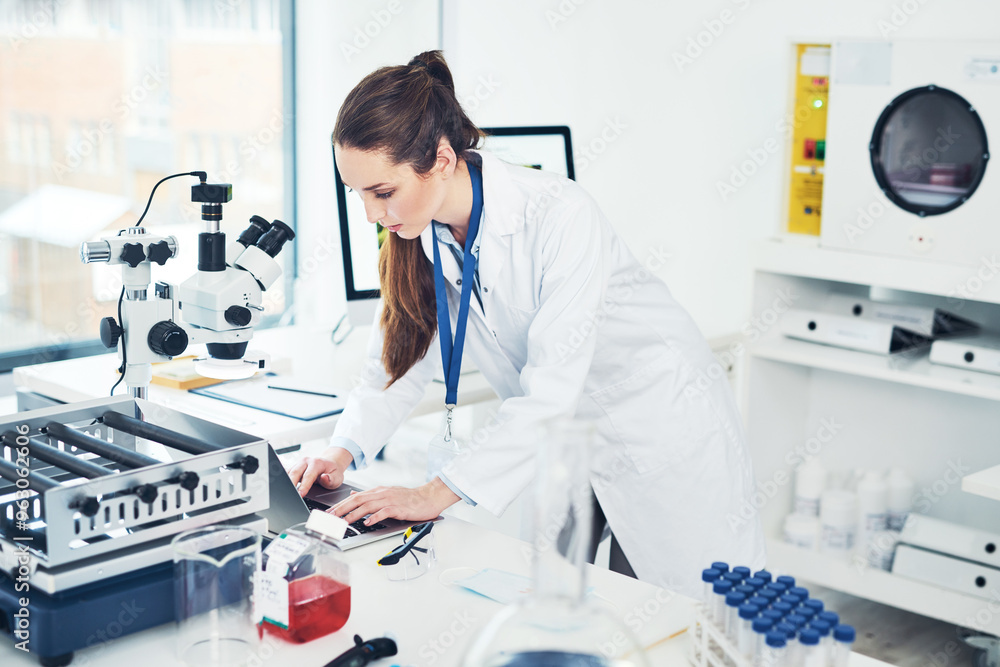 Science, data and woman in laboratory with laptop for vaccine development in medical study. Biotech engineer, technician or scientist in office typing research results for pharmaceutical innovation Science, data and woman in laboratory with laptop for vaccine development in medical study. Biotech engineer, technician or scientist in office typing research results for pharmaceutical innovation