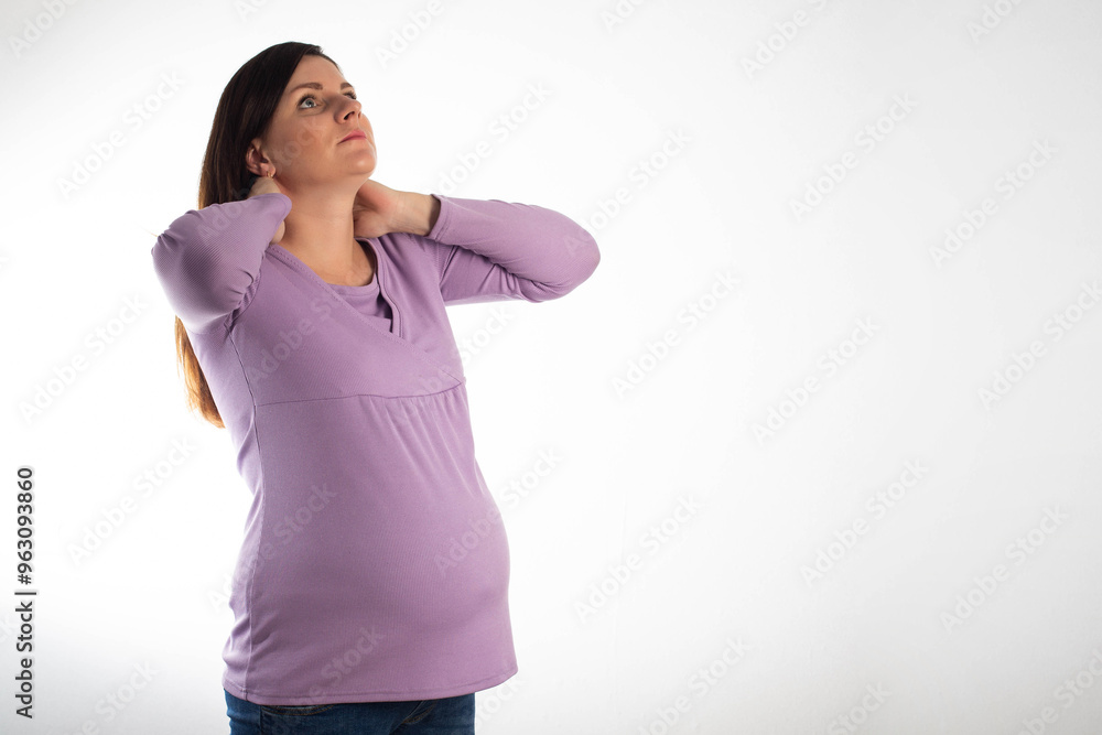 Φωτογραφία Neck pain in a pregnant girl in a purple blouse on a white background