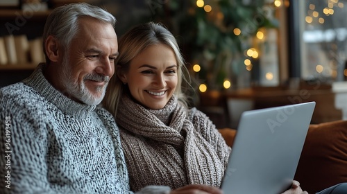 Smiling couple sitting at home using laptop surfing web sites choosing goods in internet stores buying purchasing Cheerful wife and husband spend family budget Saving time with online : Generative AI