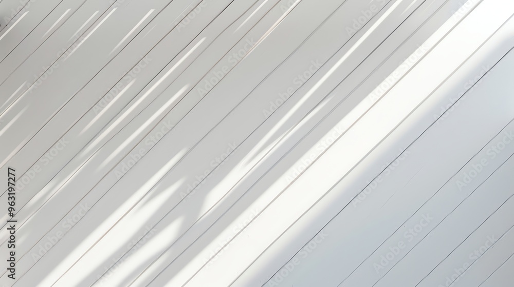 A white wall with shadows of window panes. A white wall with shadows of window panes.