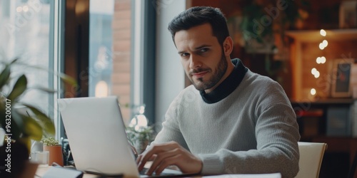 Busy Man Focused on Laptop