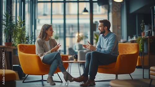Tech professionals talking to each other in a coworking office Two business people having a conversation in a workplace : Generative AI