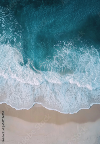 Drone shot of ocean waves hitting the shore, white sand beach, top-down view, abstract photography, aerial photography, 