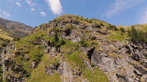 Top cinematic aerial view to the wild Romanian nature and landscape. Transfagaras, Romania. Aerial view. Traveling around Romania  photo