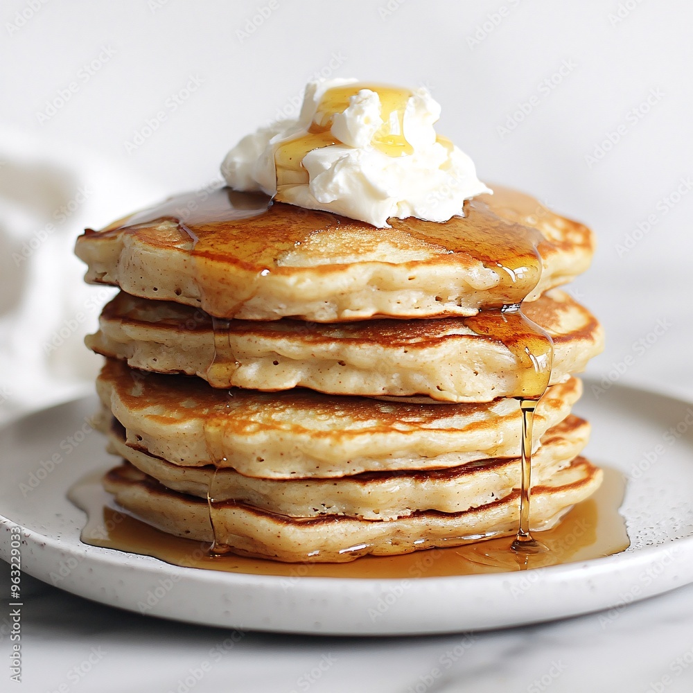 Stack of Buttermilk Pancakes Topped with Whipped Honey Stack of Buttermilk Pancakes Topped with Whipped Honey