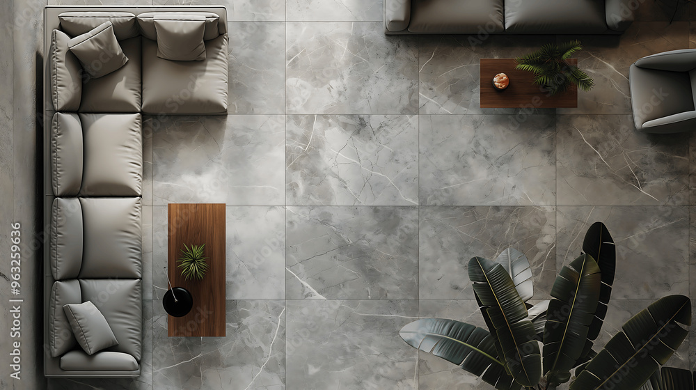 Fototapeta premium Overhead View of a Modern Living Room with Neutral Gray Sofa, Wooden Coffee Tables, and Indoor Plants Creating a Stylish and Cozy Atmosphere
