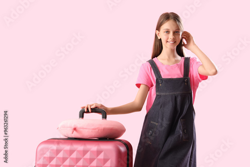 Happy little girl with suit...