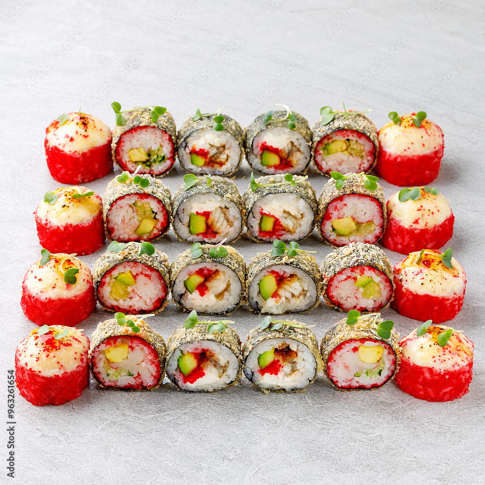 Japanese sushi tempura maki crab meat and tobiko roll on slate. Japanese traditional fusion food style, restaurant menu Japanese sushi tempura maki crab meat and tobiko roll on slate. Japanese traditional fusion food style, restaurant menu