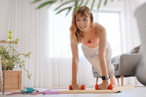 Young sporty woman training...
