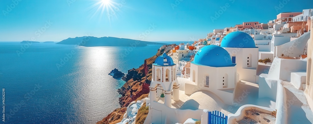 Naklejka premium Traditional Santorini whitewashed houses on clifftop