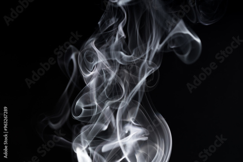 Shapeless smoke is chaotic white on a black background