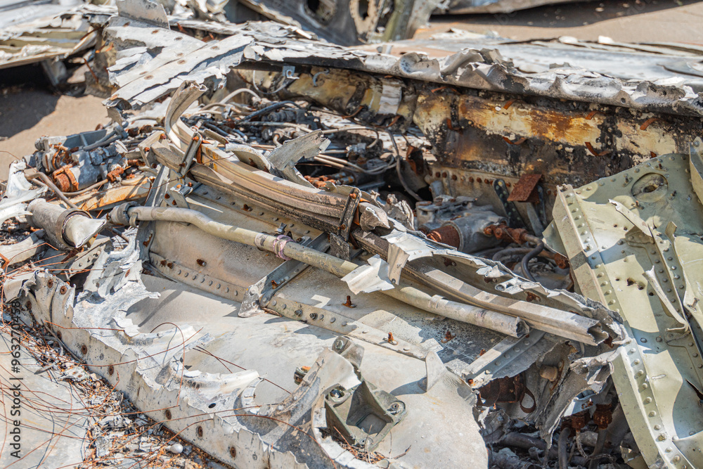 Crashed warplane, Ukrainian fighter jet remains. Texture of the remains of a crashed fighter plane Russian-Ukrainian war. Details of the plane crash Crashed warplane, Ukrainian fighter jet remains. Texture of the remains of a crashed fighter plane Russian-Ukrainian war. Details of the plane crash
