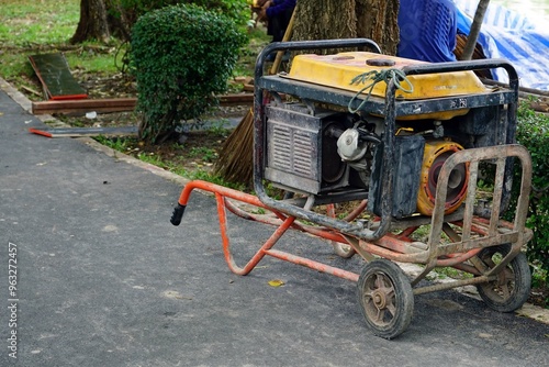 A generator on a wheelbarrow for construction work at the construction site