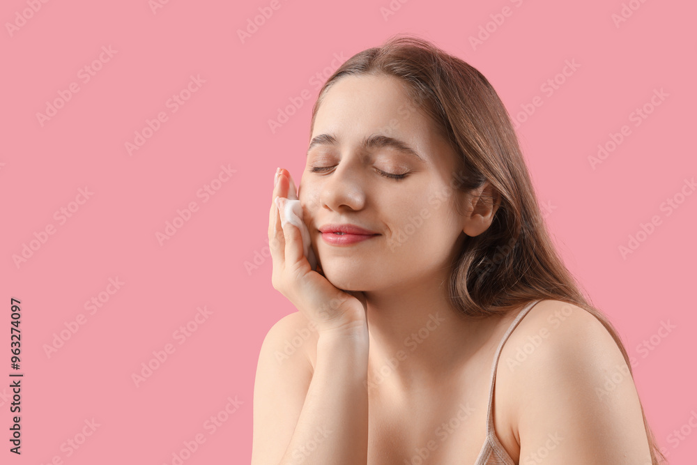Young woman with cleansing foam on pink background, closeup Young woman with cleansing foam on pink background, closeup