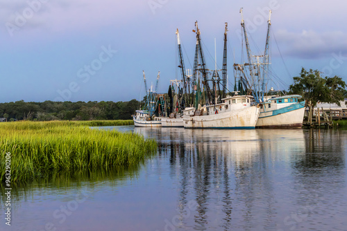 Shrimp boats sitting in a dock photo