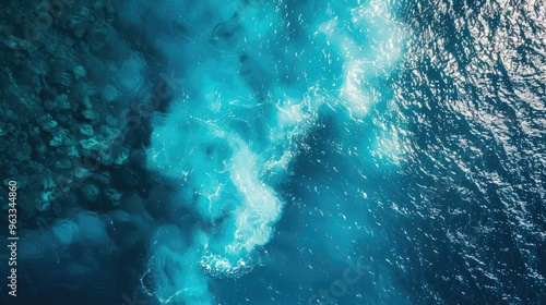 Tropical sea seen from above with blue surface and movement.