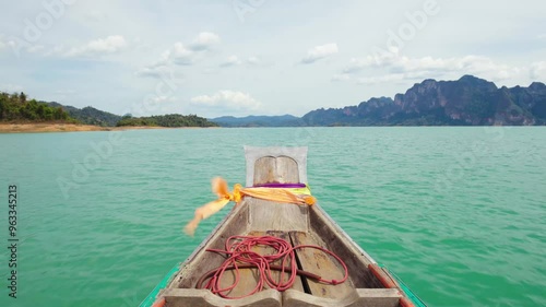 Medium view on the nose of the boat on the Cheow Lan lake in Thailand