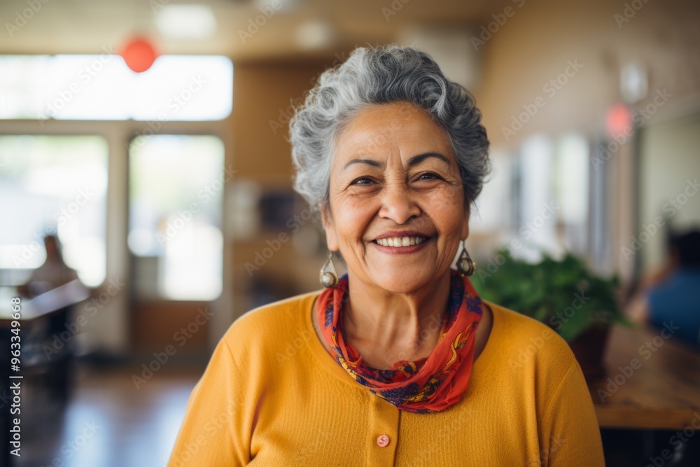 Smiling portrait of a happy senior Mexican woman in nursing home Smiling portrait of a happy senior Mexican woman in nursing home