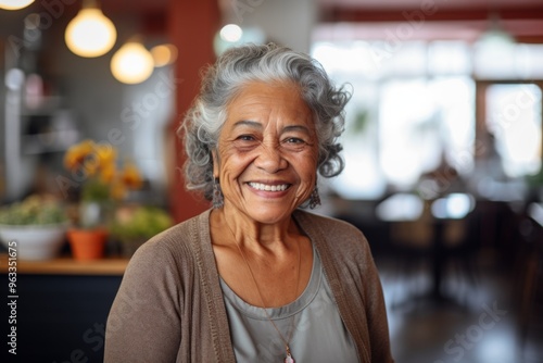 Smiling portrait of a happy senior Mexican woman in nursing home