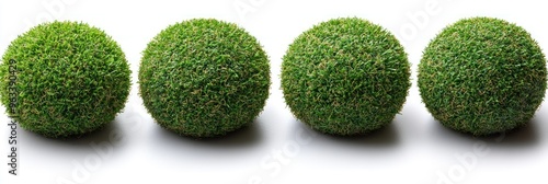 Four Green Grass Balls Arranged in a Row