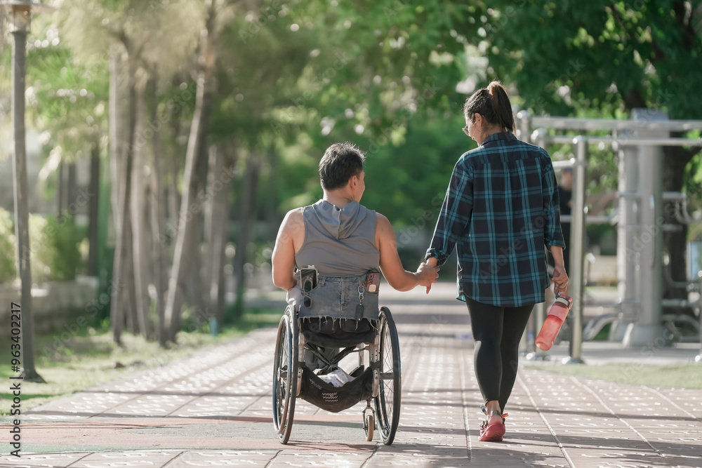 custom made wallpaper toronto digitalGirlfriend and Disabled man in wheelchair at the park. Muscular dystrophy. Young man in wheelchair and joyful woman at park.